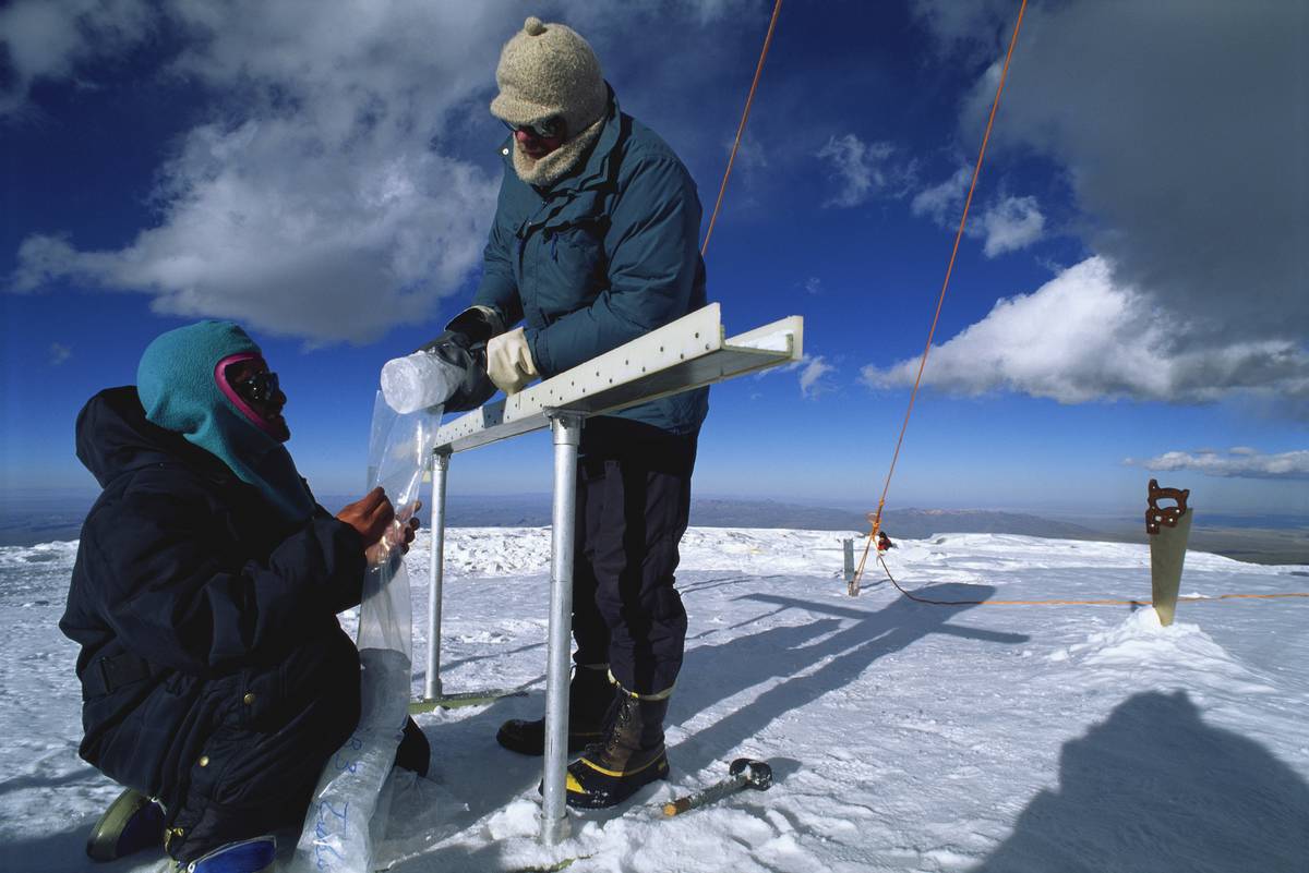 Glaciologists taking ice core samples on Nevado Sajama
