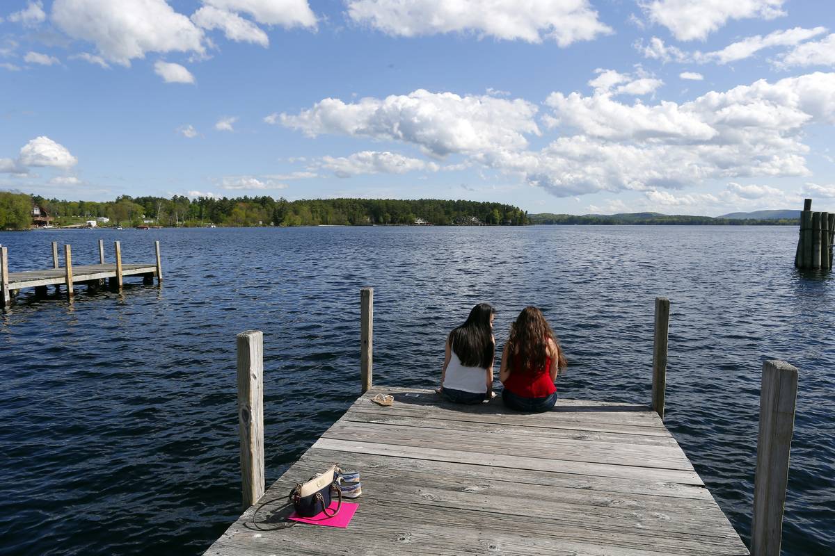 Sitting On The Lake Winnipesaukee Dock