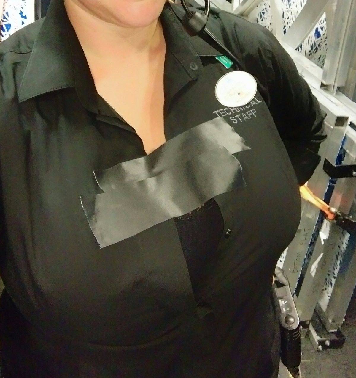 tape covering worker's cleavage at work
