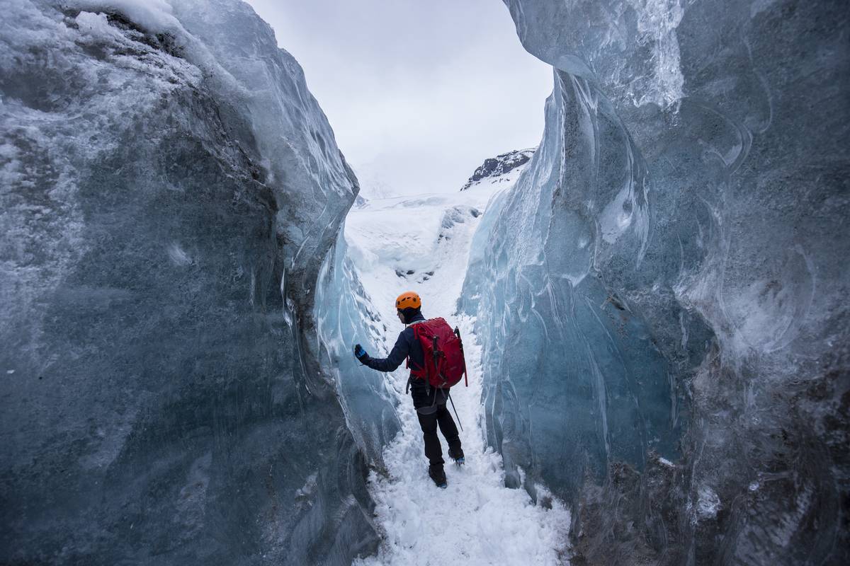 Tourist on Svinafellsjokull Glacier in Iceland