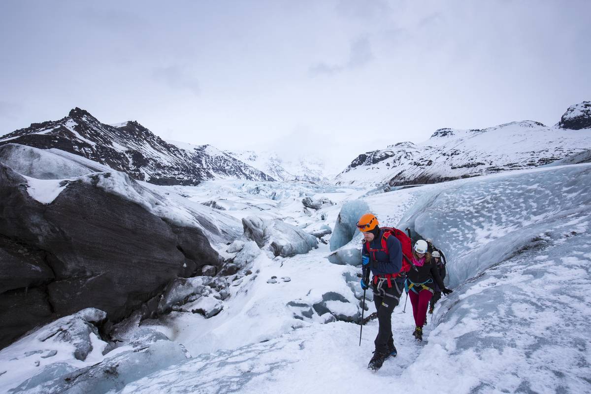 Tourists on Svinafellsjokull Glacier in Iceland