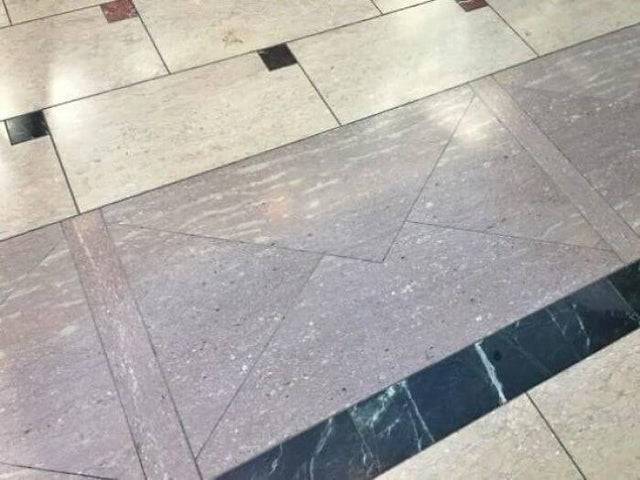 Mail envelope floor tiles in US Postal Offices