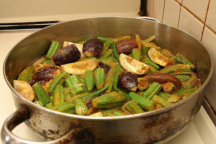 non-stick pot with vegetables and potatoes on a stove