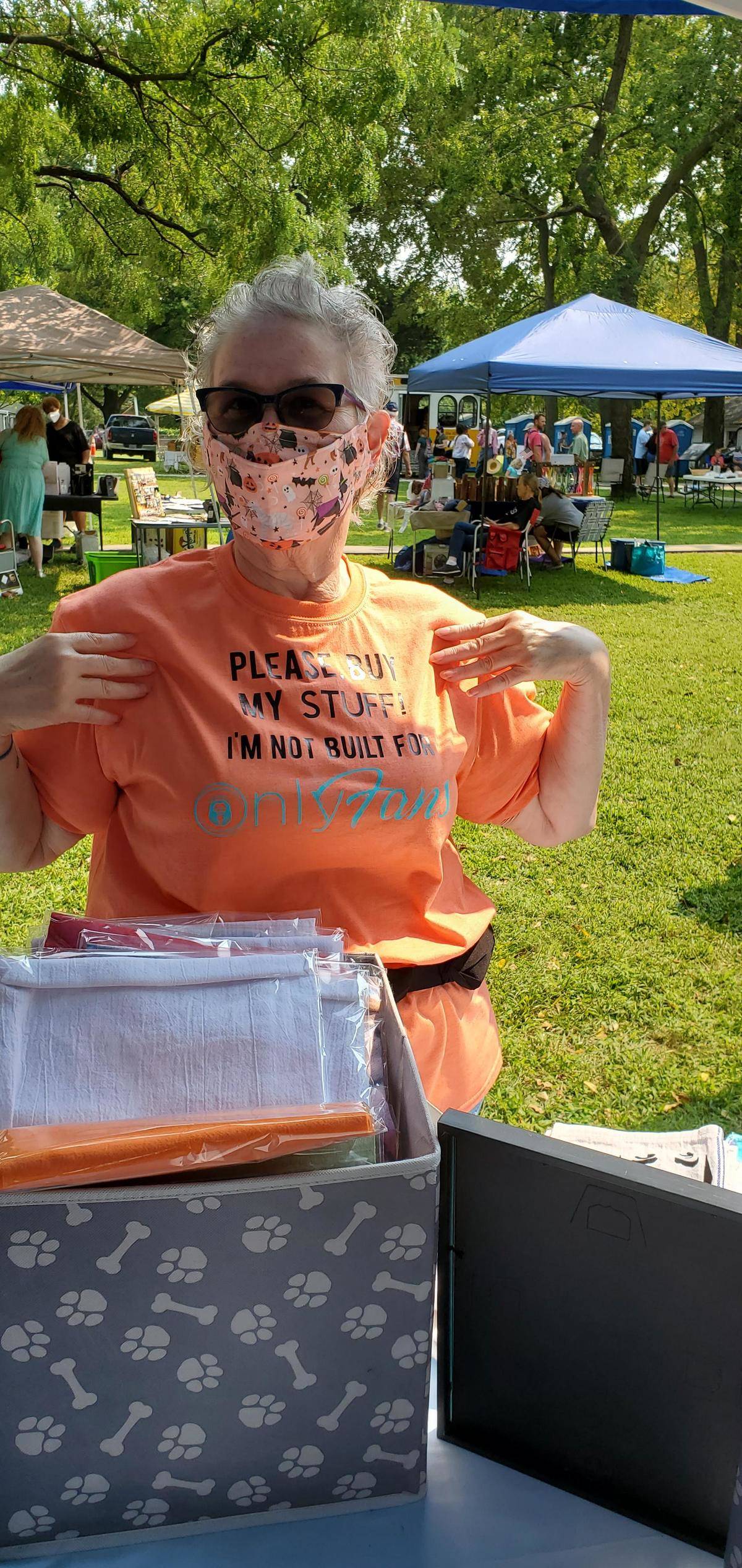 Woman wearing Onlyfans tshirt at local craft show