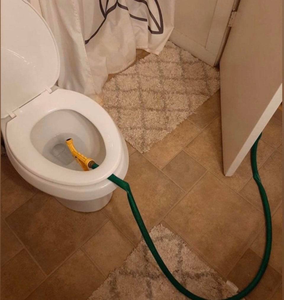 Garden hose in a toilet