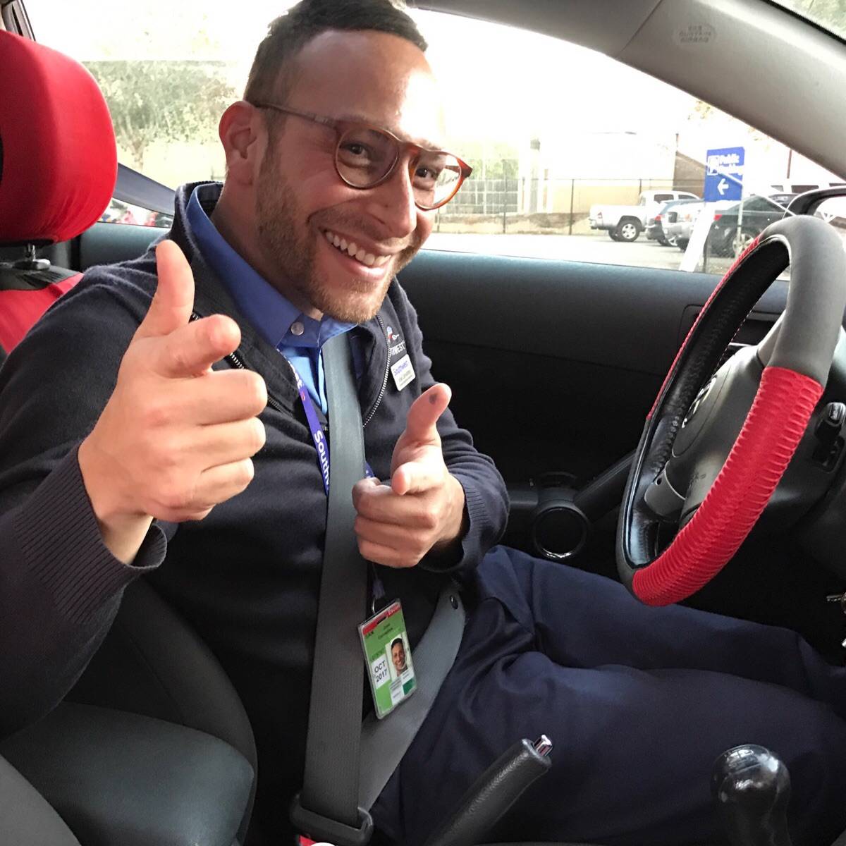 Southwest Airlines employee posing in car