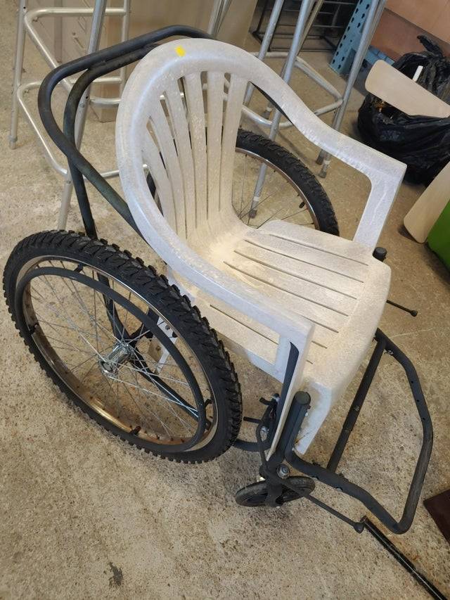 Picnic chair made into a wheelchair. 