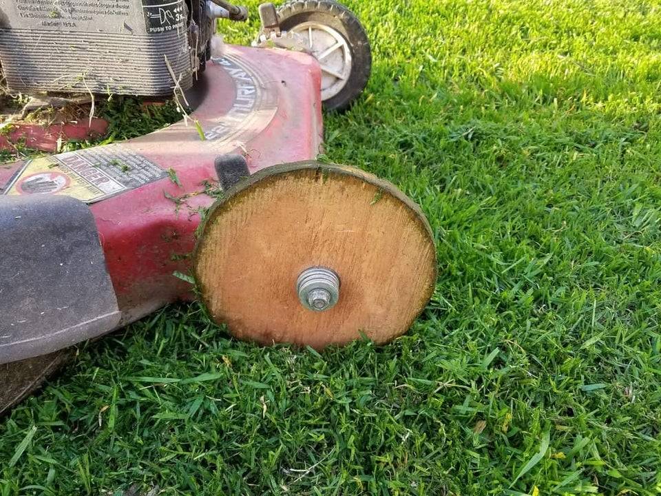 Lawnmower with a wooden wheel 
