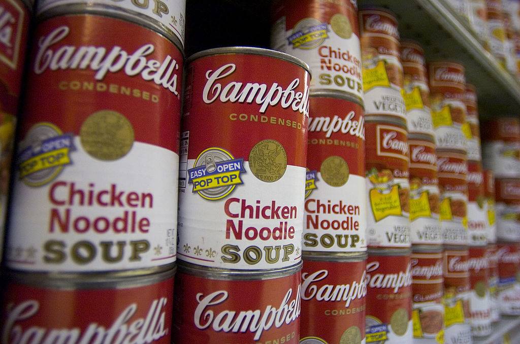 Cans of Campbell's chicken noodle condensed-soup sit on display