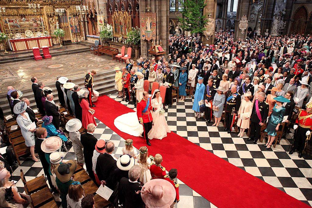 Prince William and his new bride Catherine Middleton walk down the aisle at the close of their wedding ceremony at Westminster Abbey