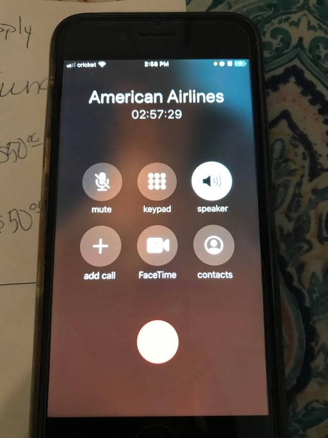 iPhone showing someone has been on hold with American Airlines for three hours