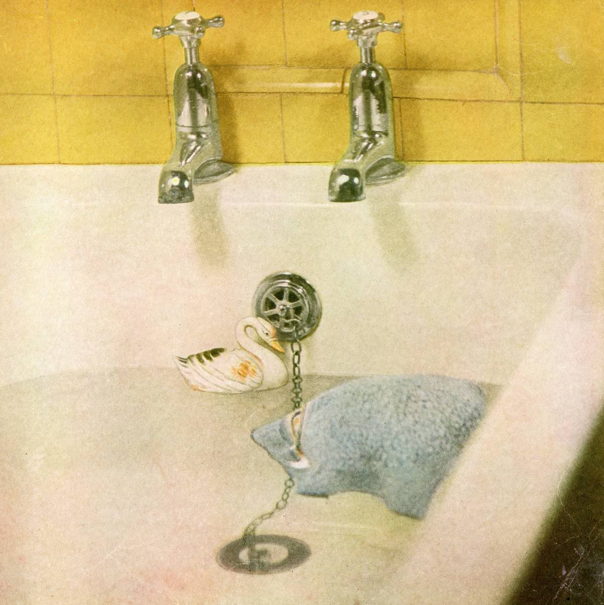 A bathtub and children's toys.