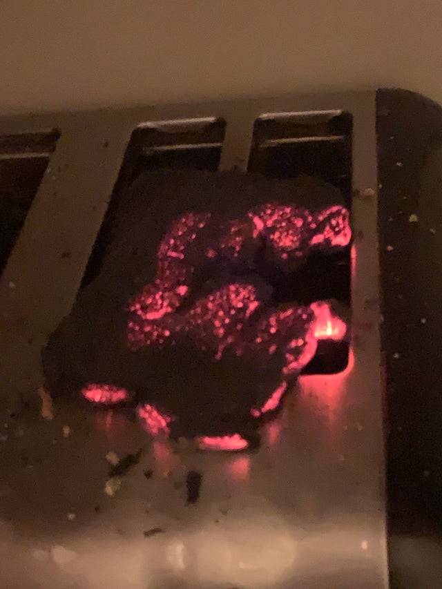 Red hot piece of burnt toast
