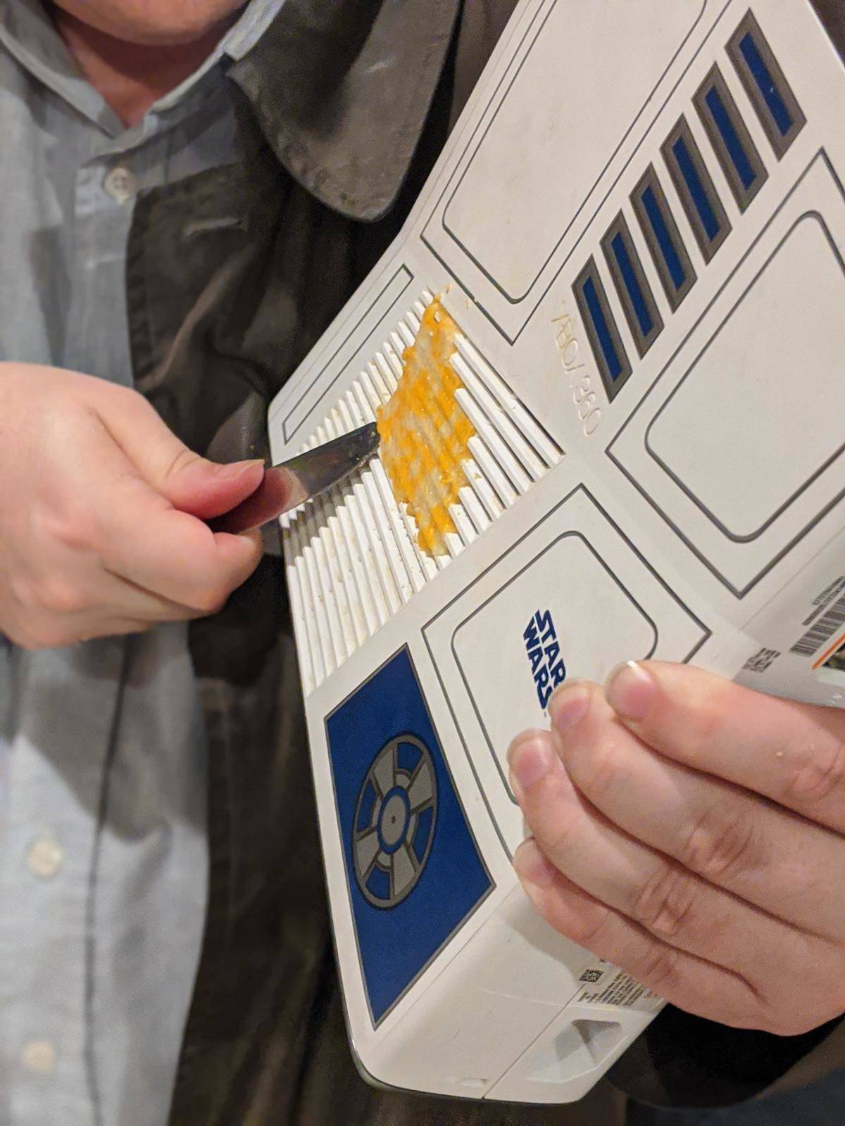 Cheese slice melted on an R2-D2 Xbox