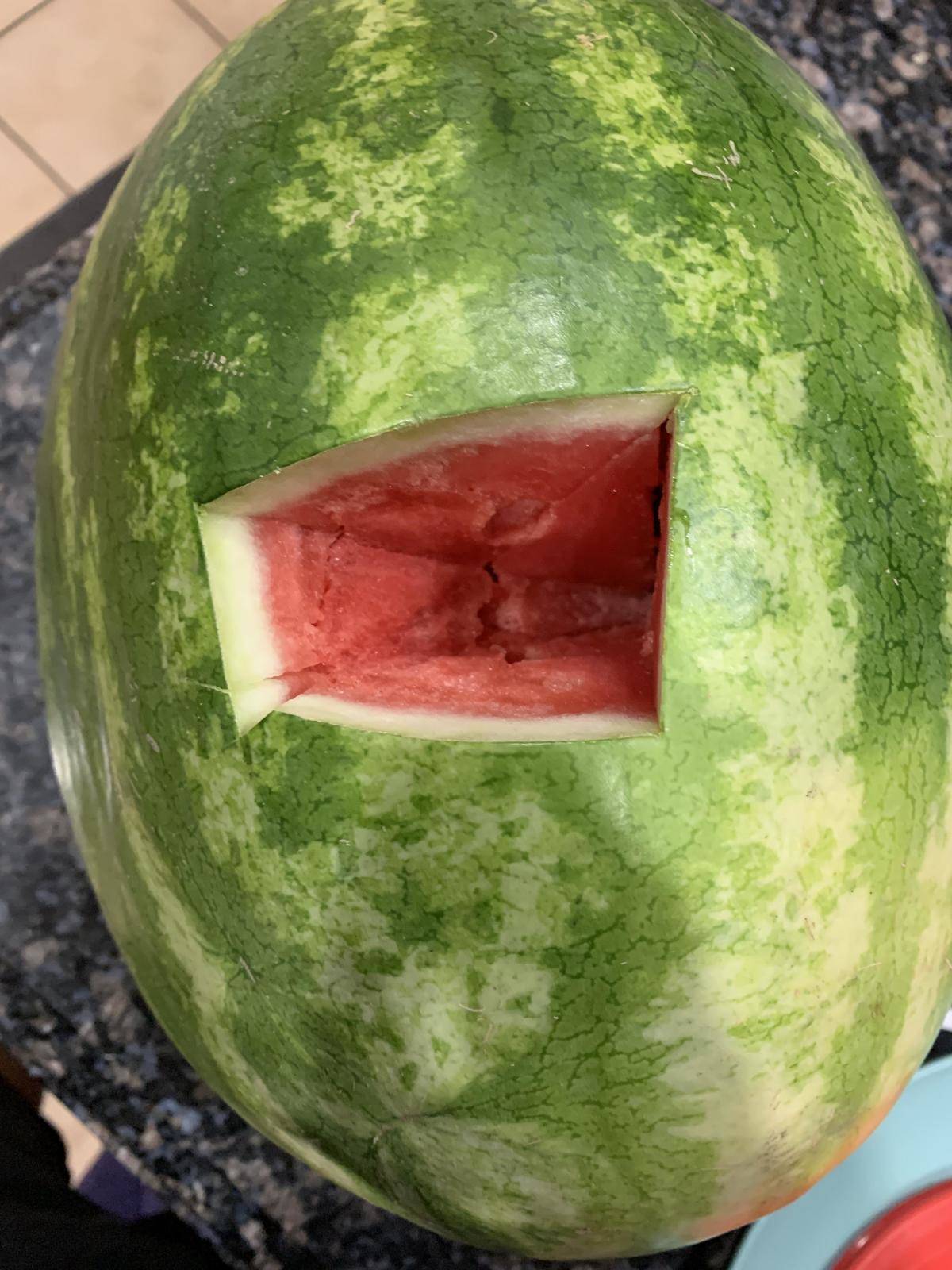 Watermelon with a chunk missing