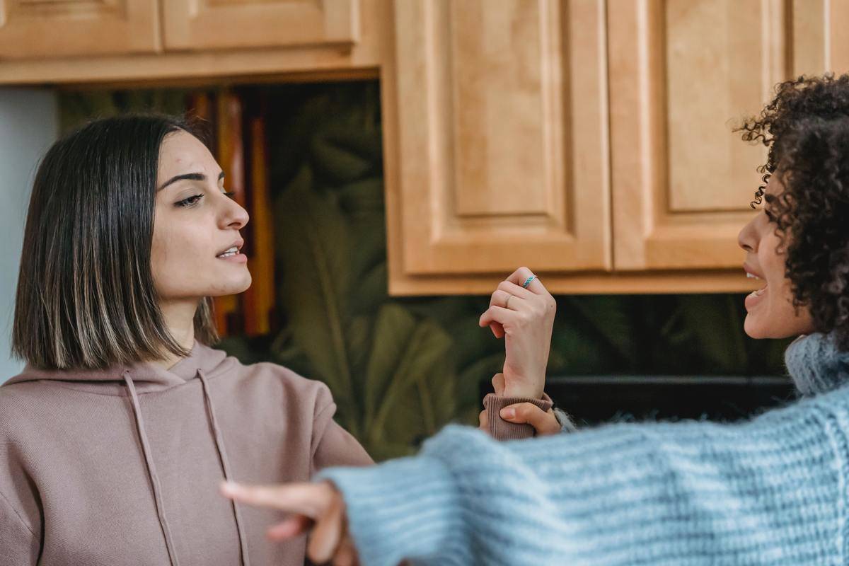 Women in fight in kitchen