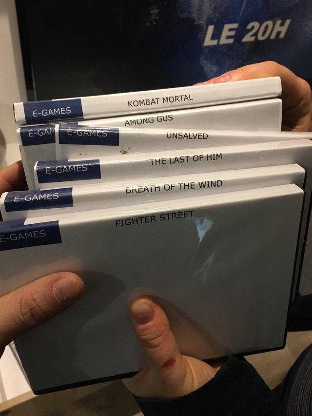 Fake video game cases with made-up titles.