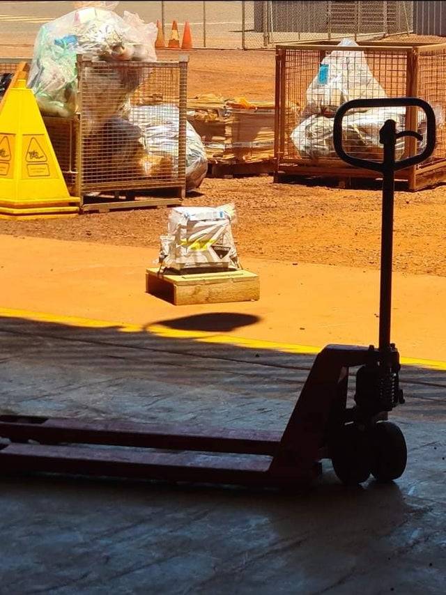 Package on a dock that looks like it is floating