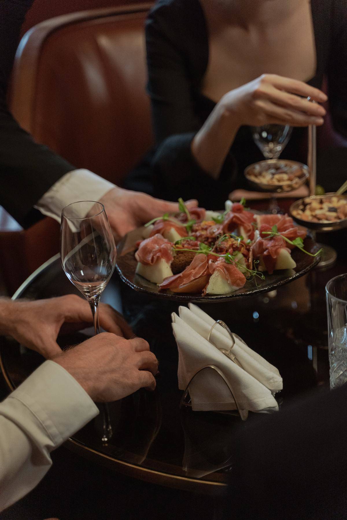 Restaurant table of fancy food and drinks