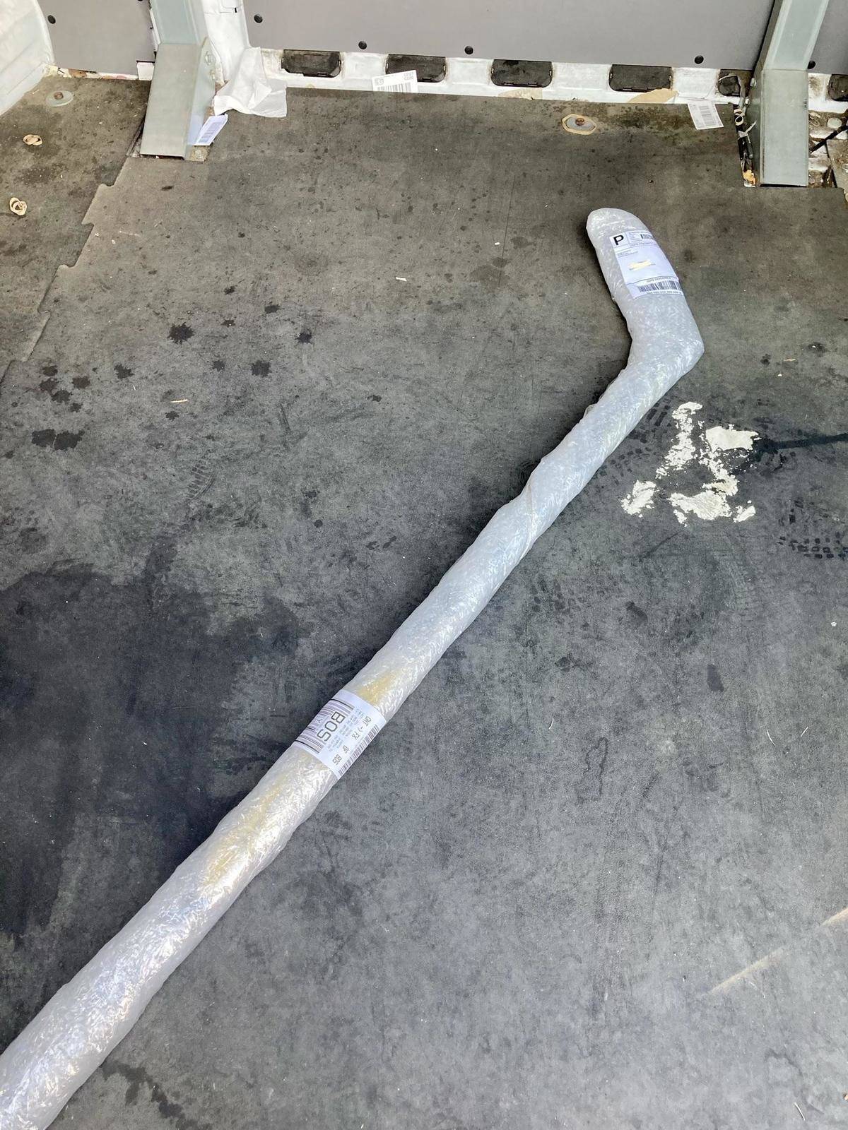 Hockey stick wrapped in packaging wrap