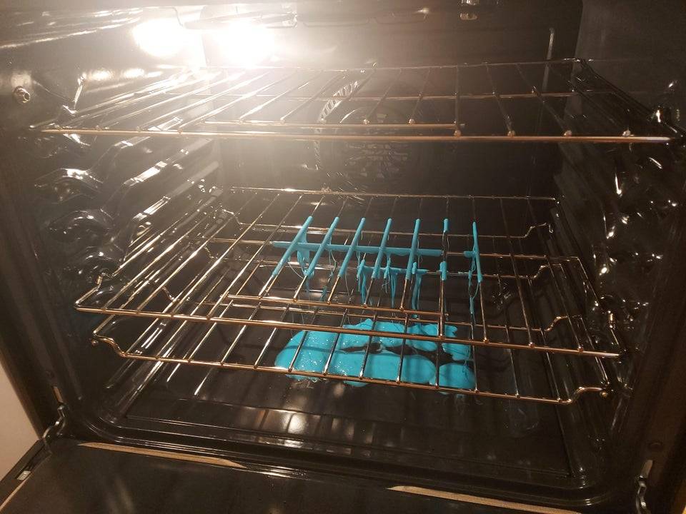 Melted blue cutting boards in oven