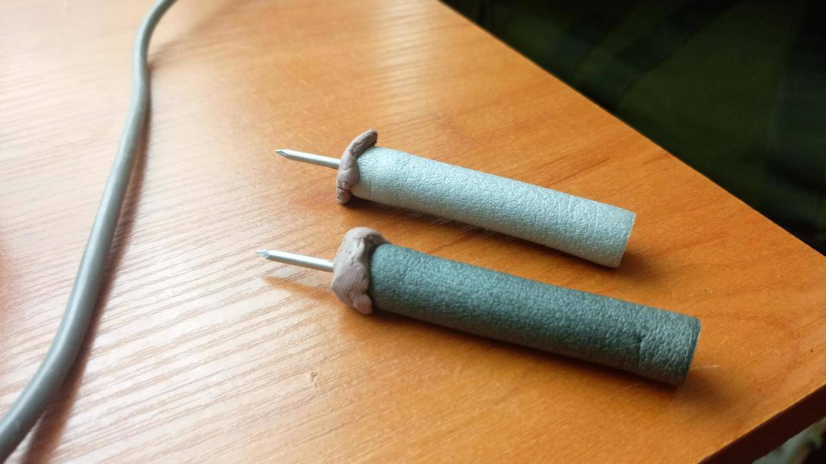 Nerf bullets converted into darts using Play-Doh and toothpicks