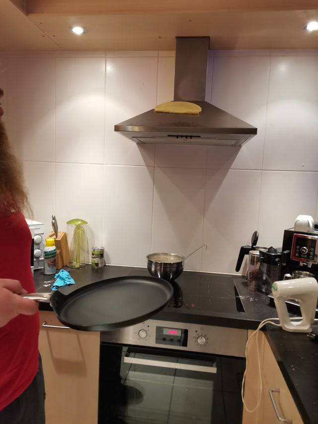 Pancake on top stove hood from flip gone wrong