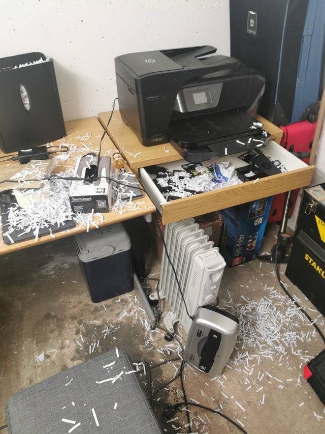 Shredded paper all over the floor and counter. 