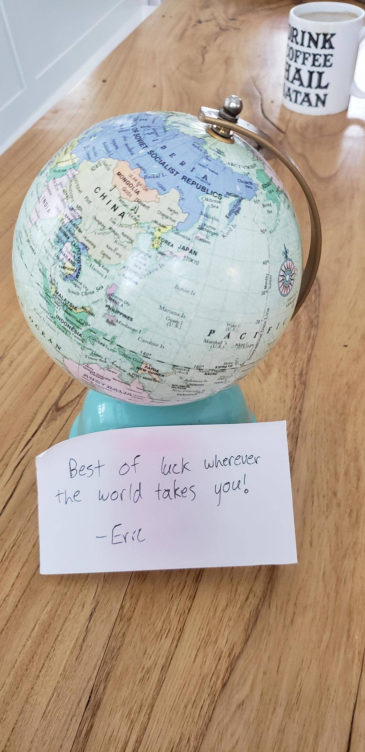 Globe with a good luck message.