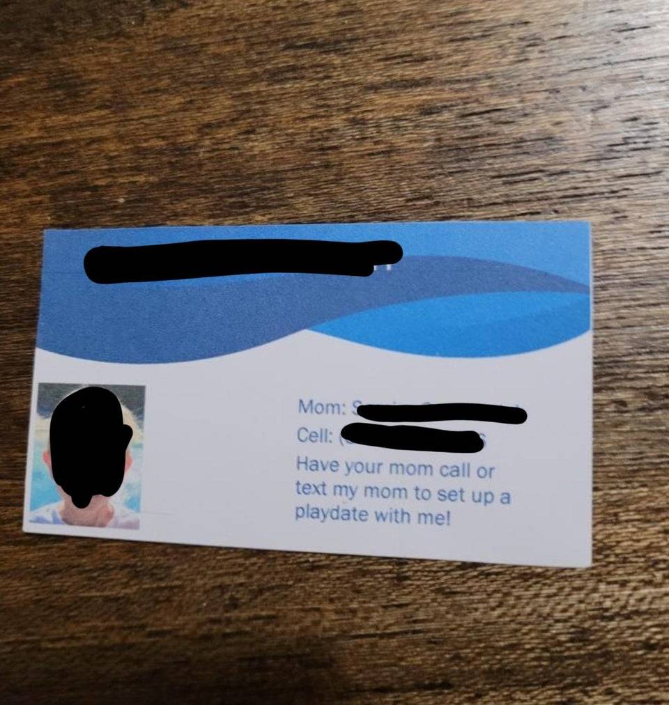Playdate business card carried by child