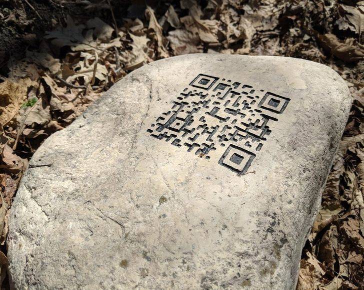 QR code in rock along trail