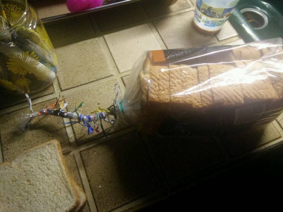 Loaf of bread with many ties on it.