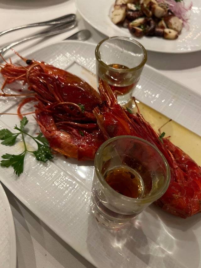 Two large shrimp that cost $53 each. 