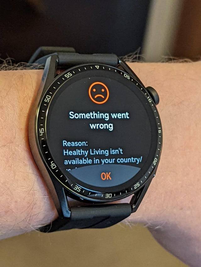 Smart watch displaying alert that healthy living is not available