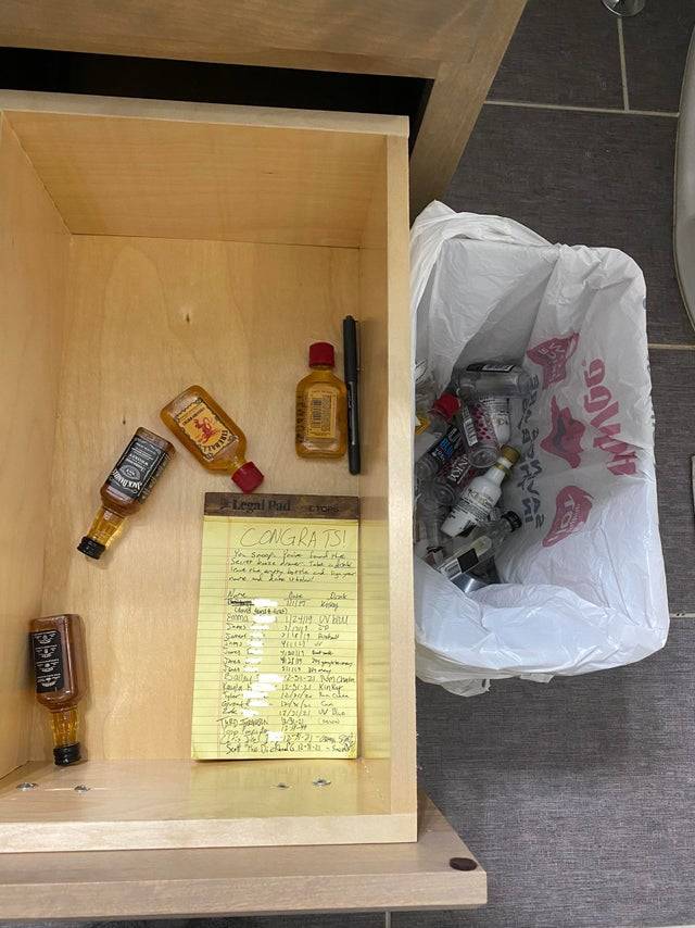 Mini alcohol bottles in a drawer.