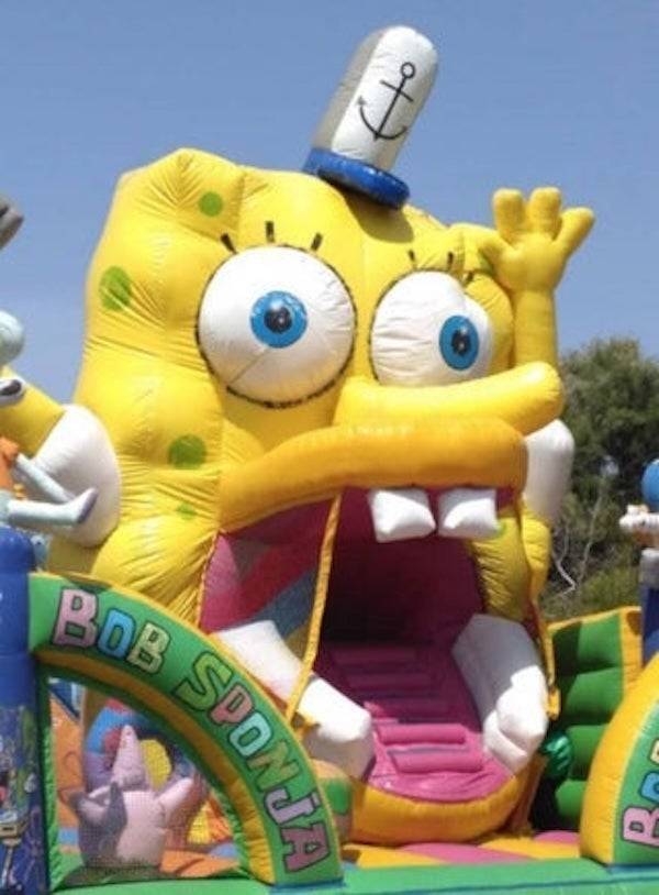 Scary-looking SpongeBob bouncy castle.