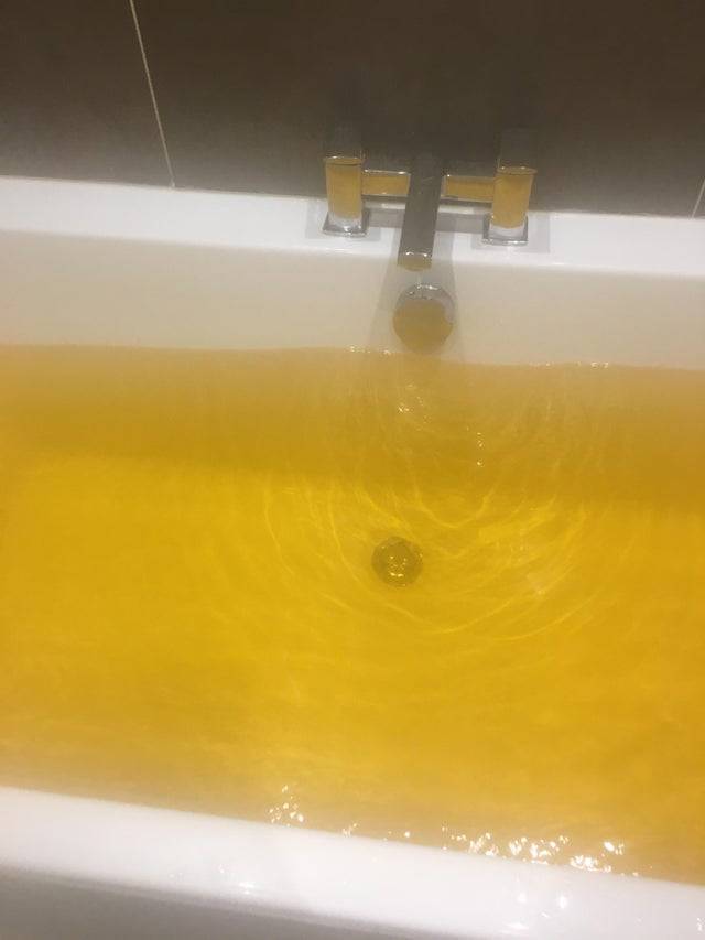 Yellow bath bomb makes a person's bath water look pee-yellow. 