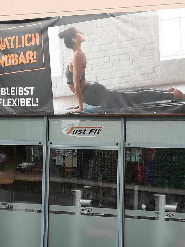 Poster of woman doing a yoga pose and facing the wrong way