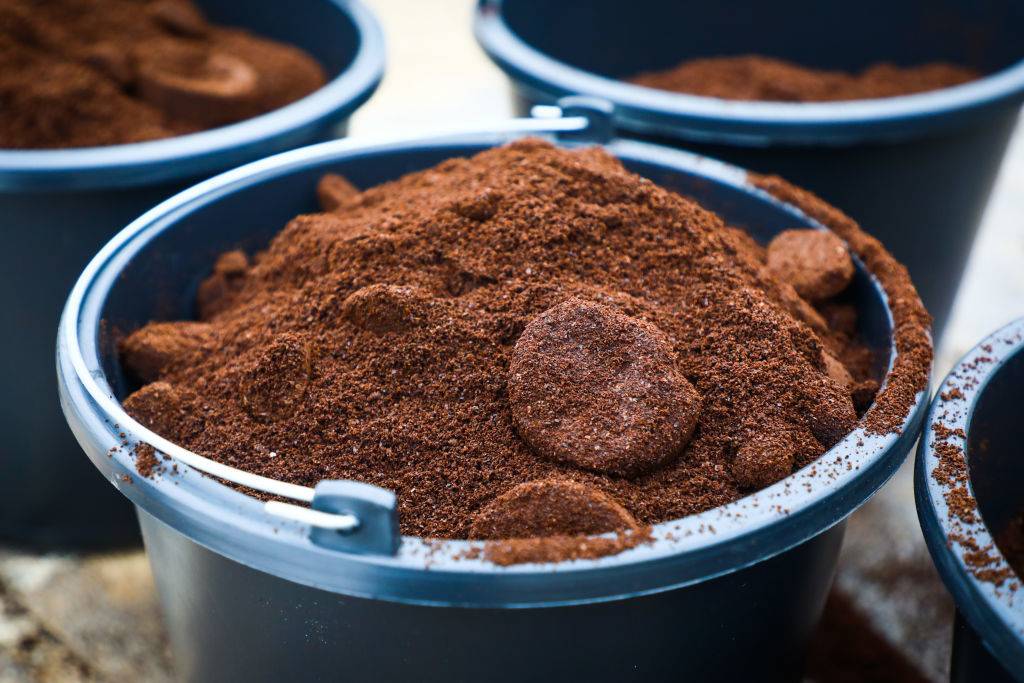 Pails with coffee grounds