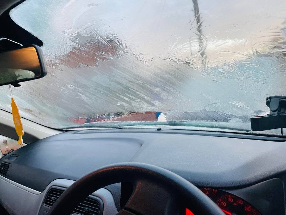 ice inside the car on the windows