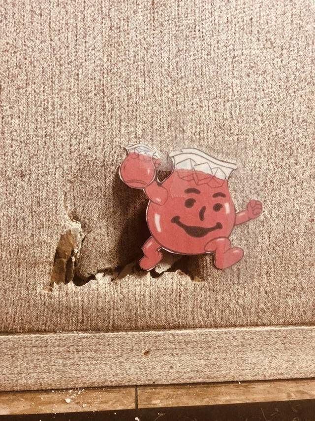 kool-aid man fixes the hole