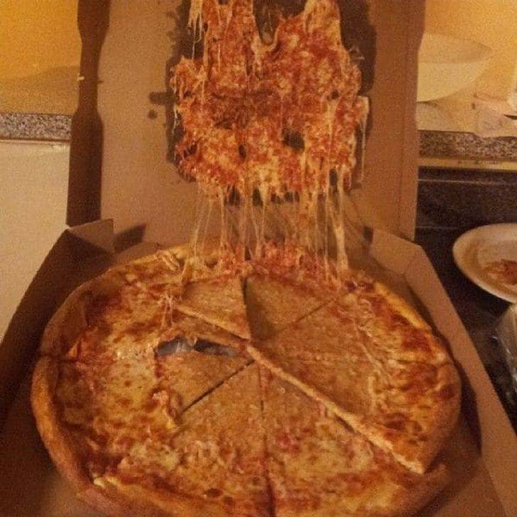 pizza destroyed in the box