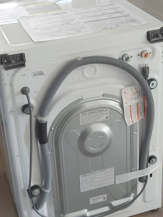 smile on washing machine on the back