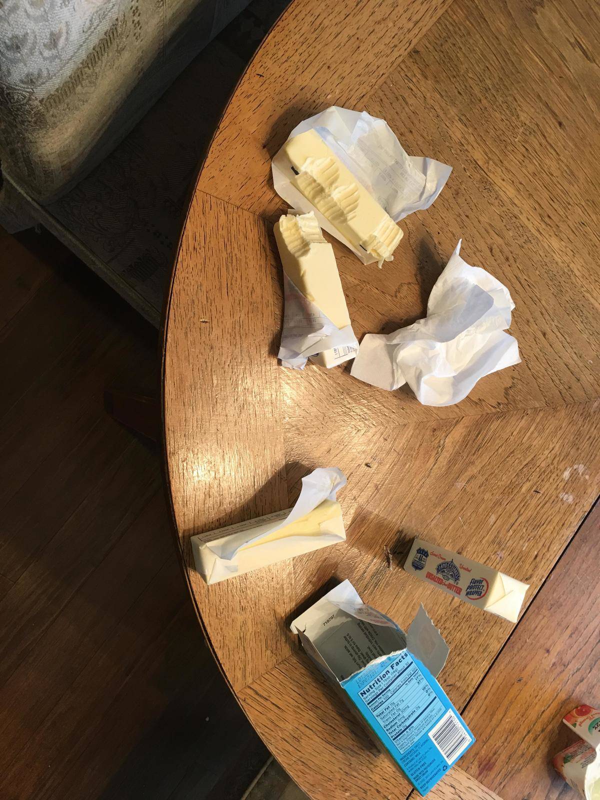 Butter eaten by child left on table with teeth marks