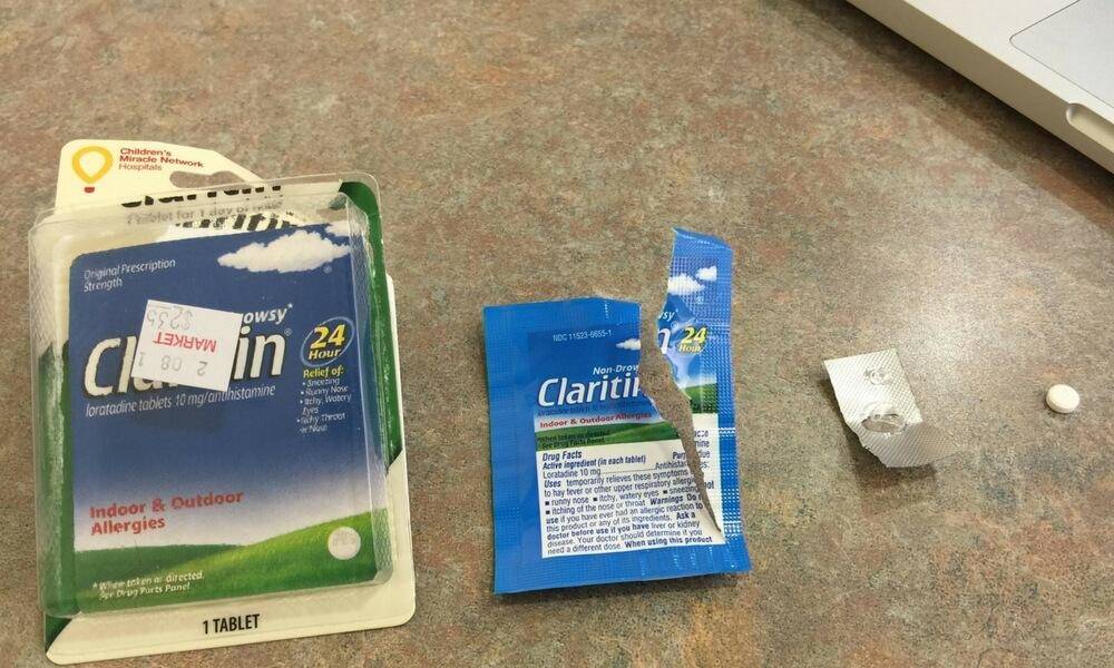 Claritin allergy pill in excessive packaging
