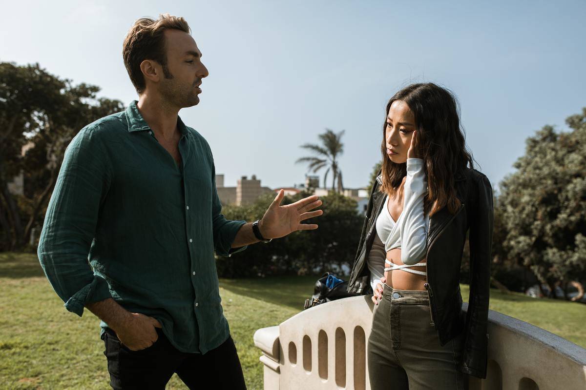 Stock image of couple fighting talking man looks like he is explaining