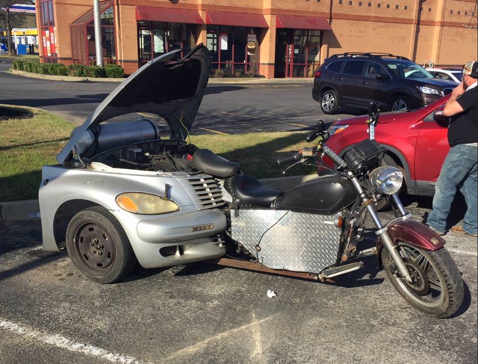 Motorcycle and the front end of a car morphed together.
