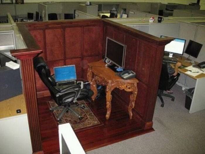Cubicle with dark wood