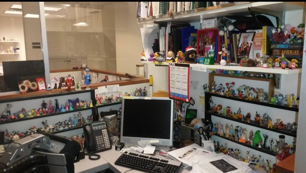 Cubicle covered in action figurines