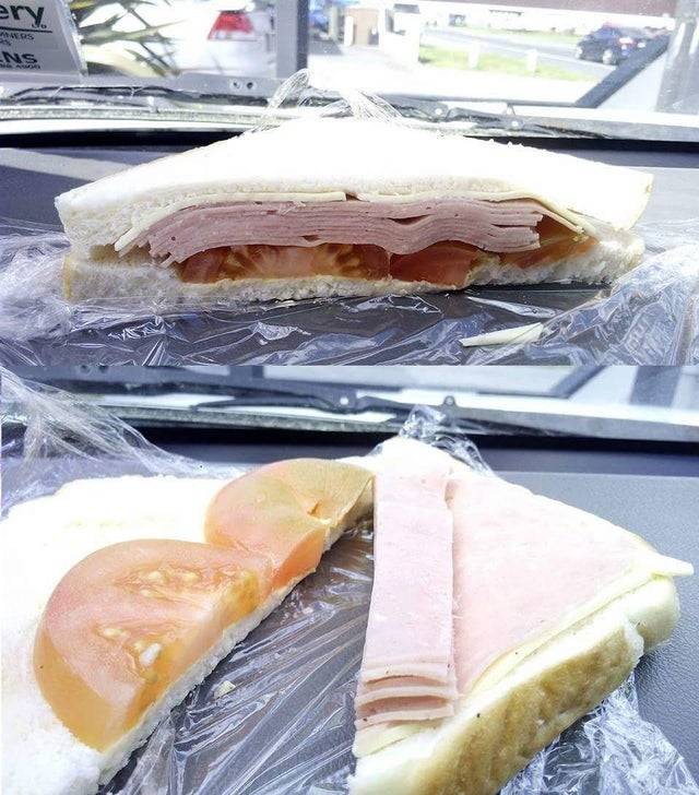 Ham sandwich from deli with ham cut and arranged to look thicker